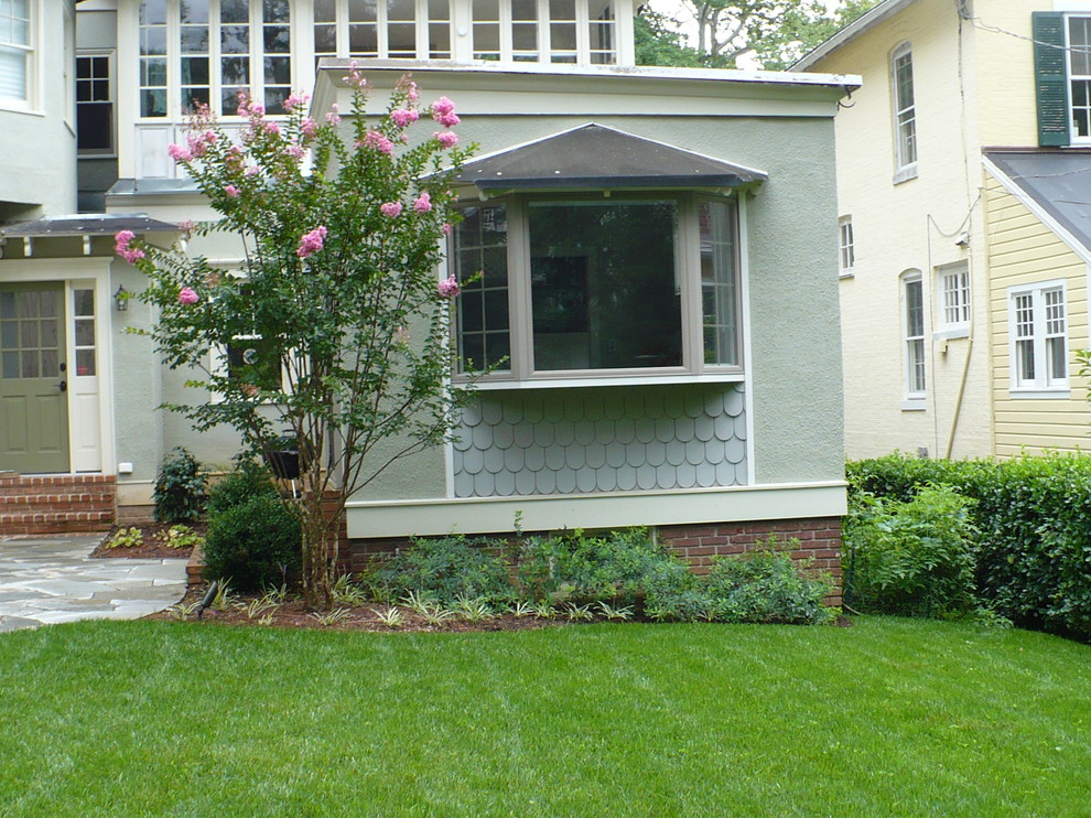This is an example of a mid-sized rustic backyard landscaping in Baltimore.