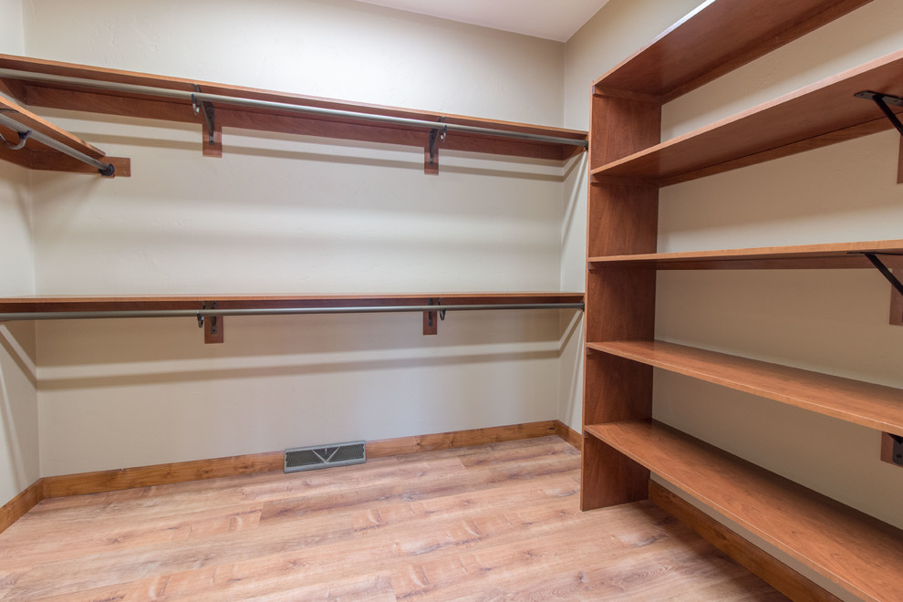Closet - rustic closet idea in Milwaukee