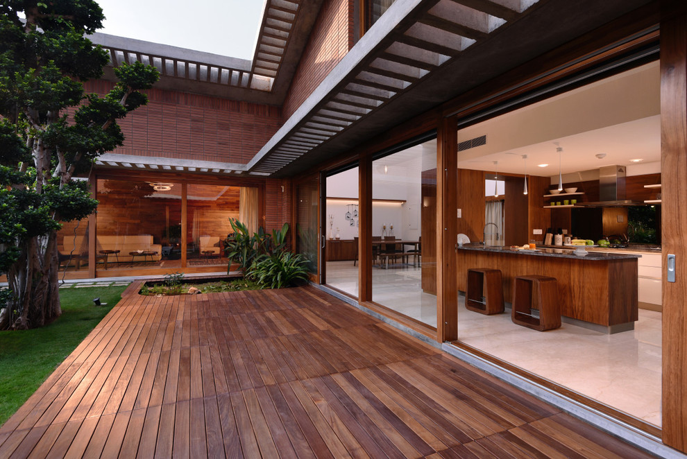 Inspiration for a mid-sized contemporary backyard deck in Bengaluru.