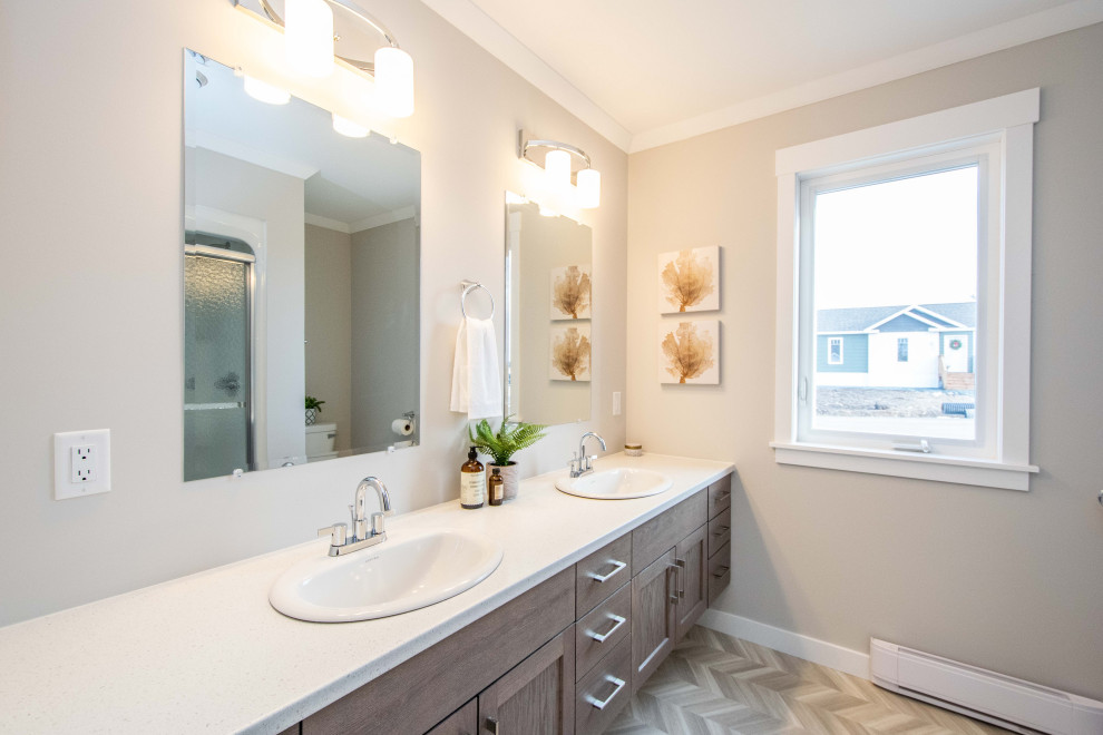 Design ideas for a mid-sized beach style master bathroom in Other with shaker cabinets, grey cabinets, an alcove tub, an alcove shower, beige walls, vinyl floors, a drop-in sink, laminate benchtops, grey floor, a shower curtain, white benchtops, a single vanity and a built-in vanity.