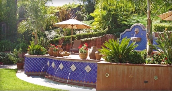 Photo of a mid-sized tropical backyard full sun garden in San Francisco.