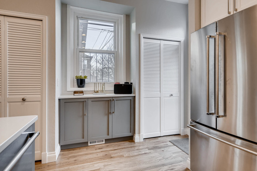 Transitional home design photo in Denver