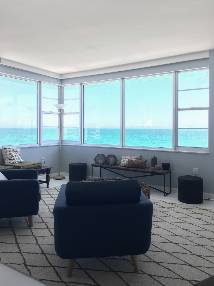 Living room - mid-sized coastal formal and open concept beige floor living room idea in Miami with gray walls, no fireplace and no tv