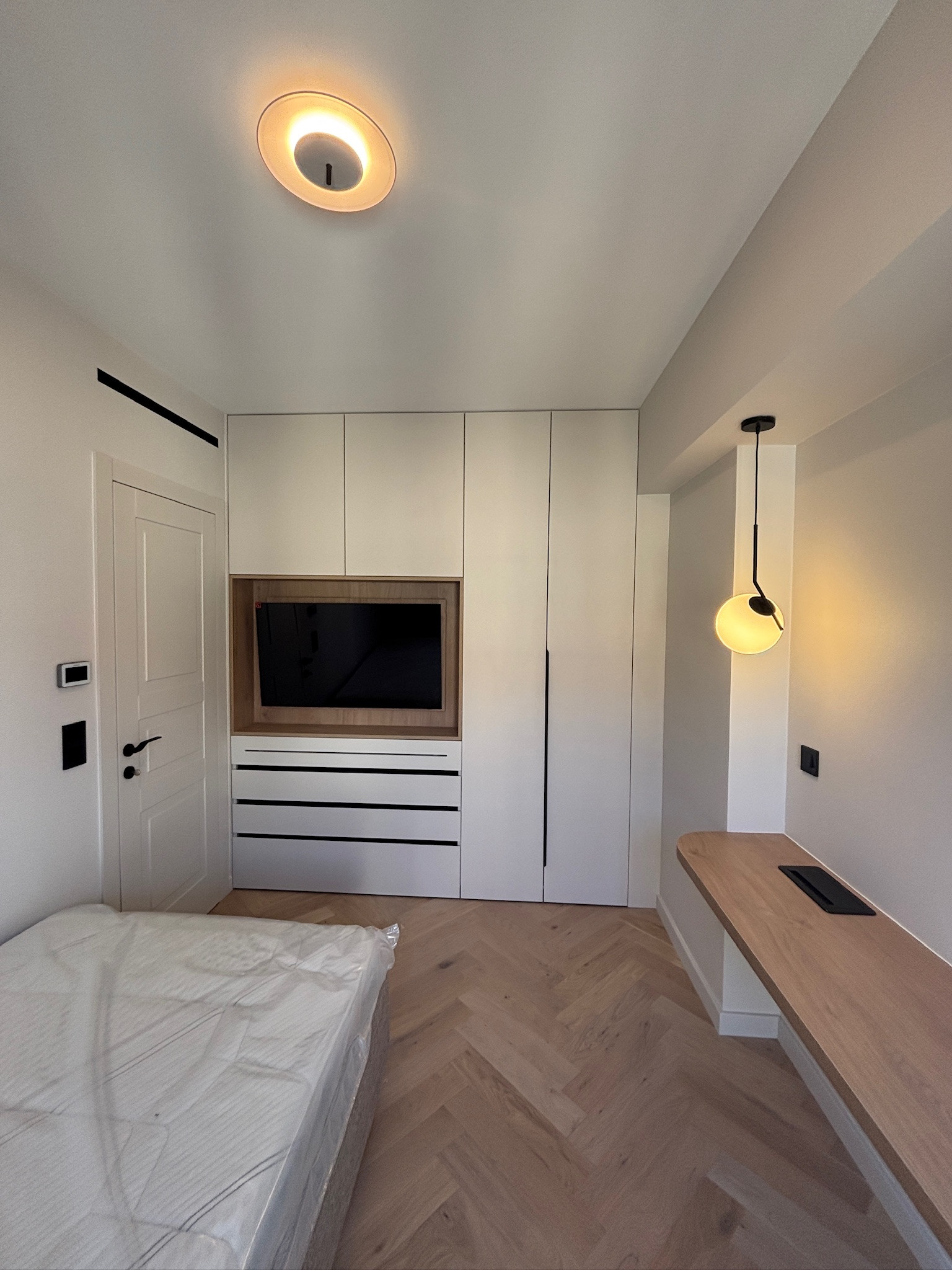 L’union parfaite : deux appartements transformés en un duplex unique