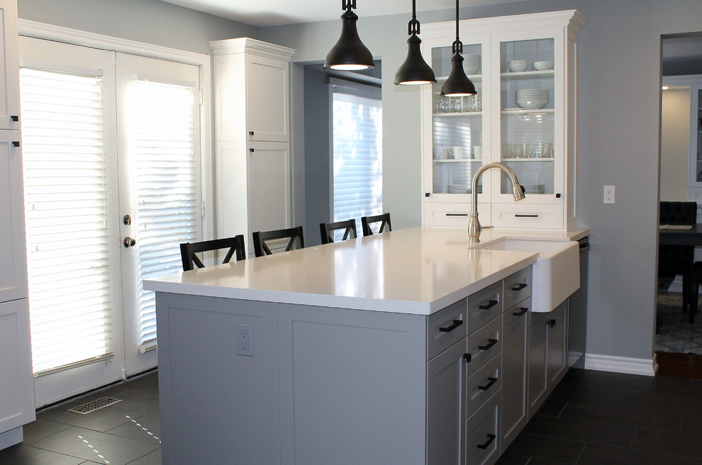 Example of a transitional kitchen design in Toronto