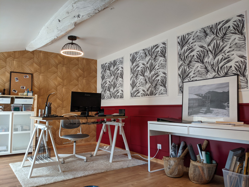 Large contemporary home office in Lyon with a built-in desk and wallpapered walls.