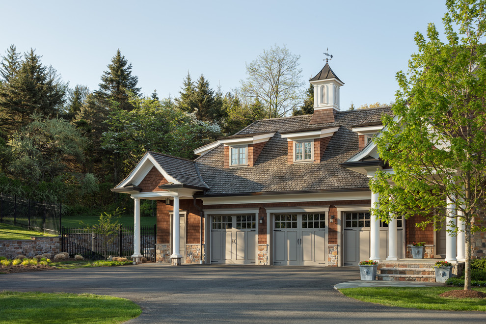 Elegant mixed siding and three-car beige garage photo in New York