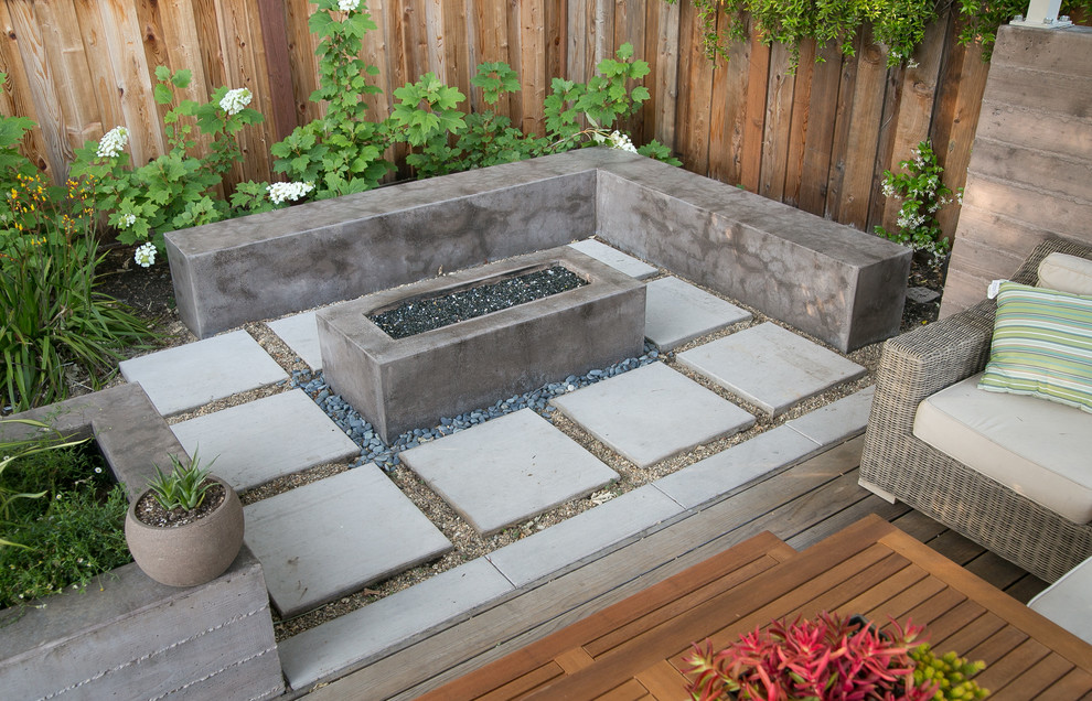 Photo of a large contemporary backyard patio in San Francisco with an outdoor kitchen and concrete pavers.