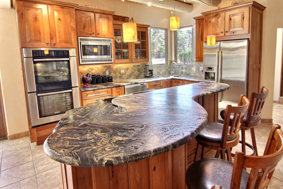Example of a mountain style kitchen design in Albuquerque
