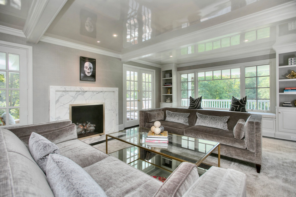 This is an example of a large transitional enclosed living room in New York with grey walls, dark hardwood floors, a standard fireplace, a stone fireplace surround, no tv and black floor.