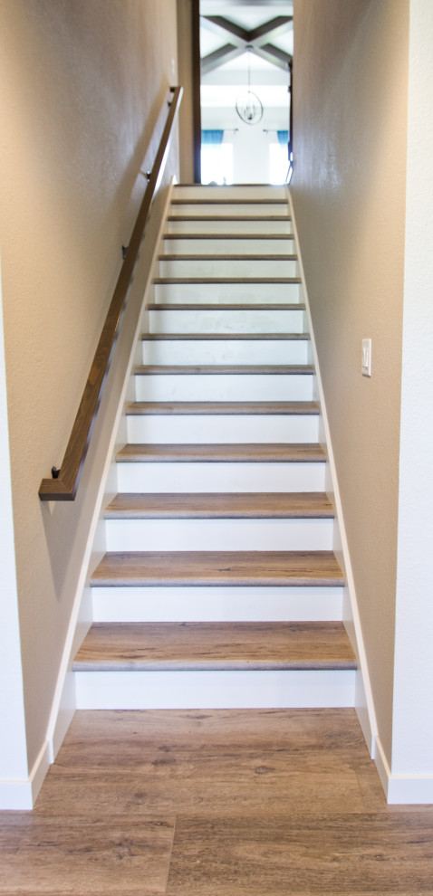 Transitional straight wood railing staircase photo with wooden risers