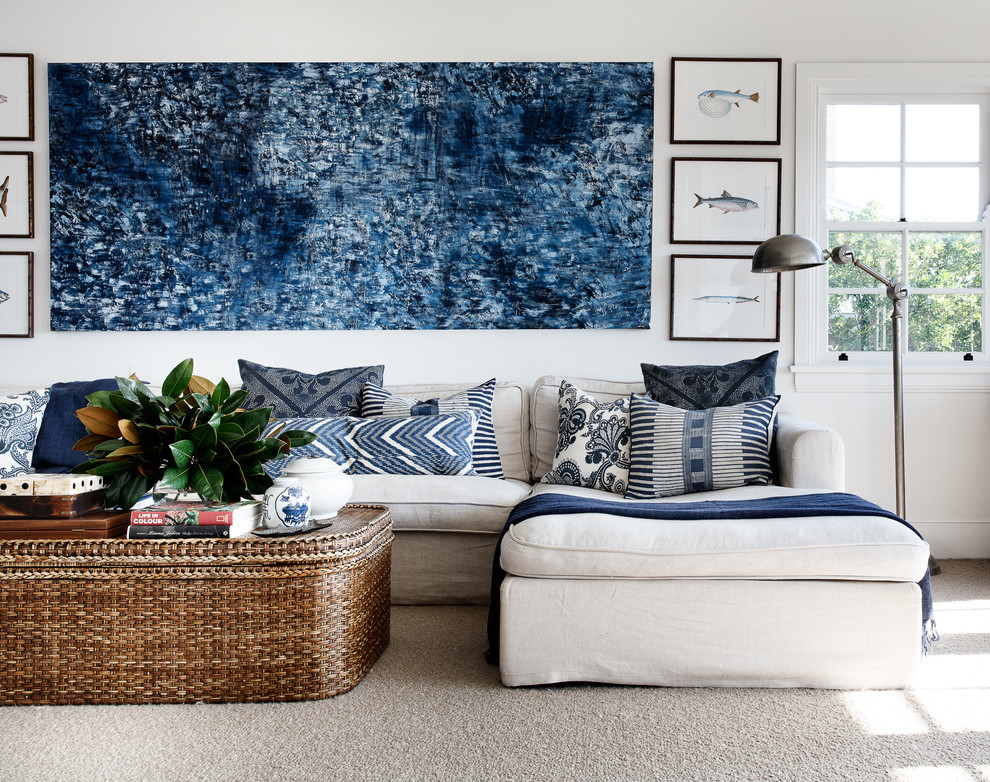 Design ideas for a transitional living room in Sydney with white walls, carpet and beige floor.