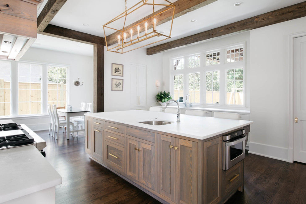 Inspiration for a large transitional u-shaped separate kitchen in Miami with an undermount sink, shaker cabinets, white cabinets, quartzite benchtops, stainless steel appliances, dark hardwood floors and with island.
