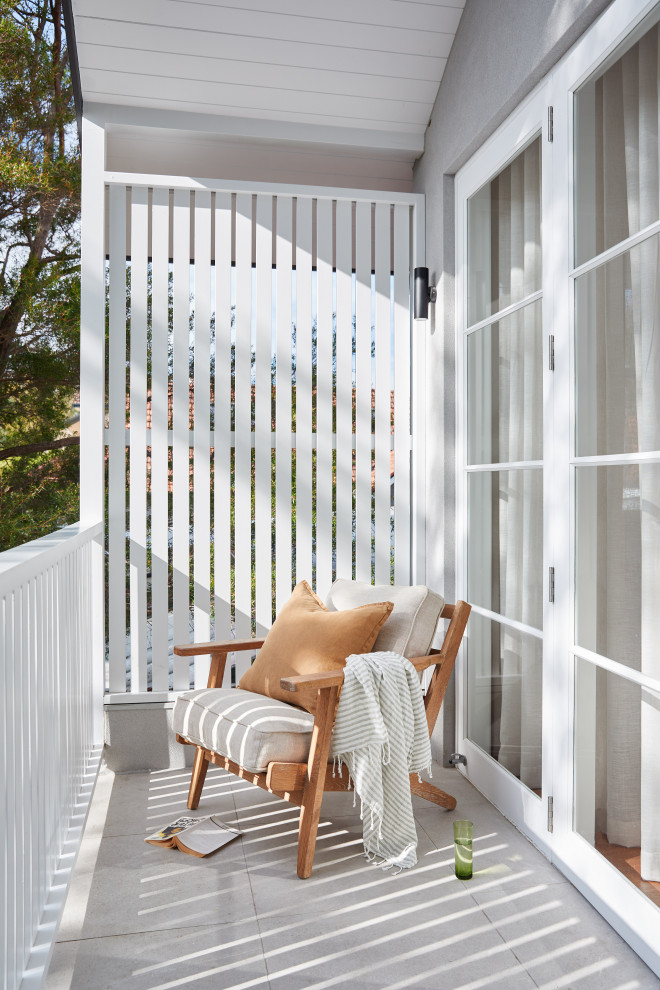 This is an example of a contemporary balcony in Sydney with fencing.