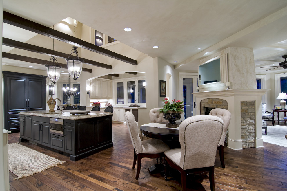 Design ideas for a traditional open plan kitchen in Minneapolis with brown floor.