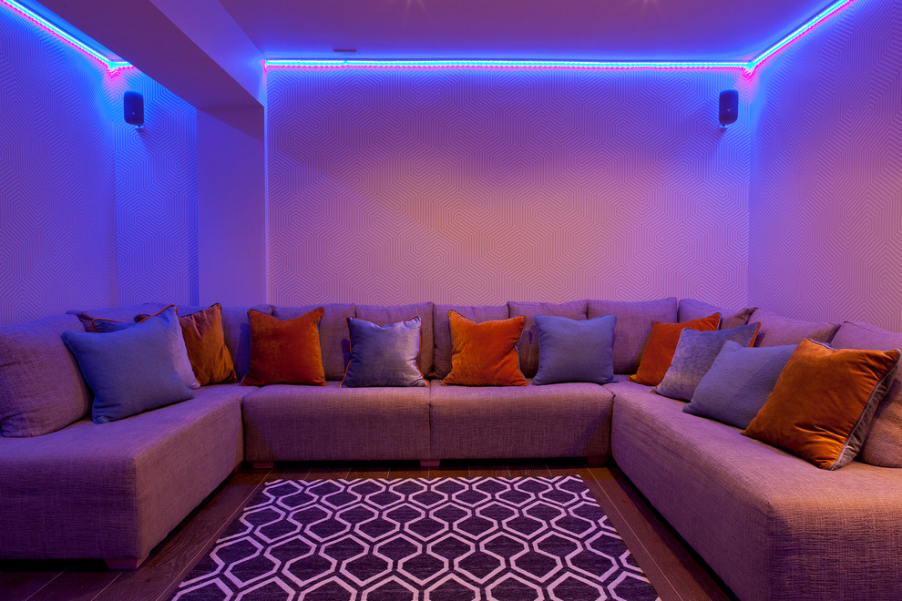 Photo of a contemporary home theatre in Cornwall with beige walls.