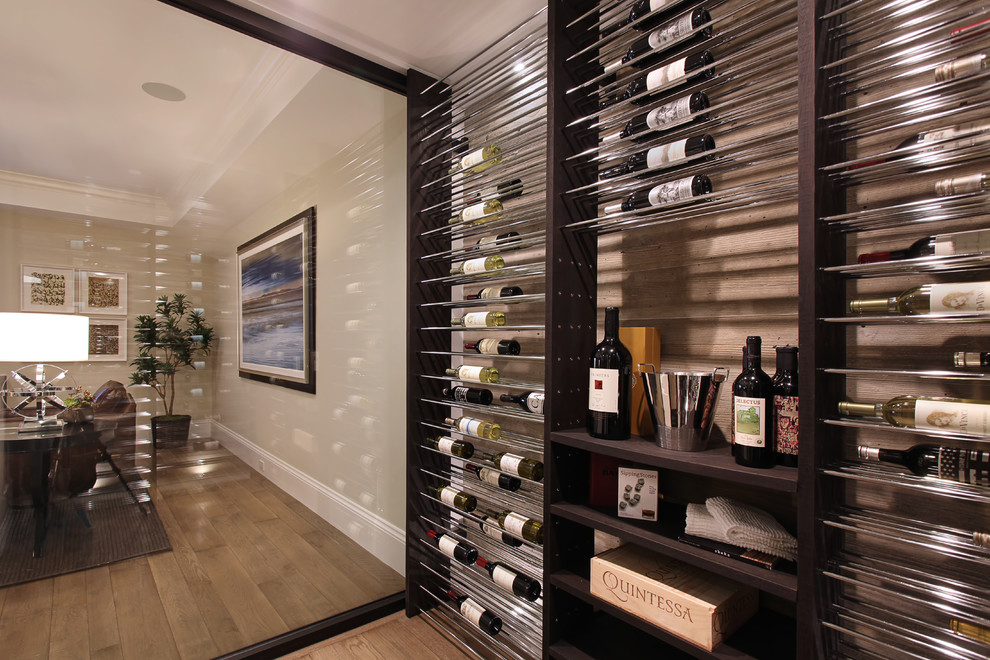 Example of a transitional wine cellar design in Orange County