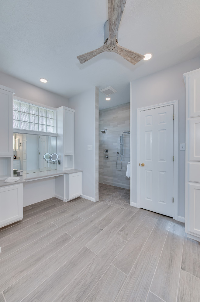 Inspiration for a large modern master bathroom in Austin with recessed-panel cabinets, white cabinets, a double shower, gray tile, mosaic tile, white walls, wood-look tile, an undermount sink, engineered quartz benchtops, grey floor, an open shower, grey benchtops, a double vanity and a built-in vanity.