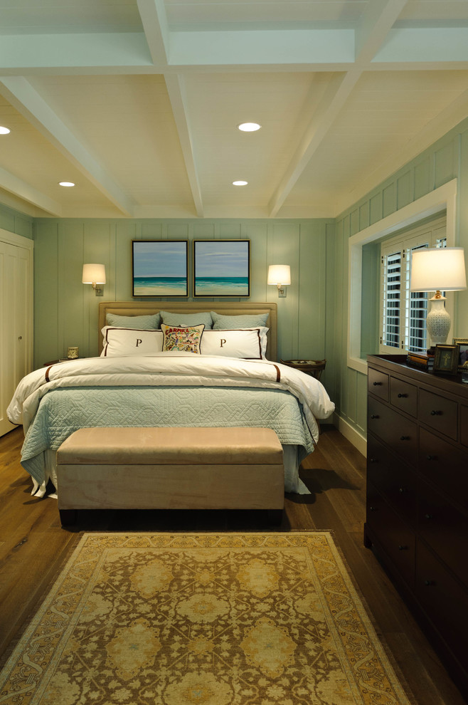 Design ideas for a mid-sized beach style master bedroom in Other with blue walls, medium hardwood floors, no fireplace and brown floor.