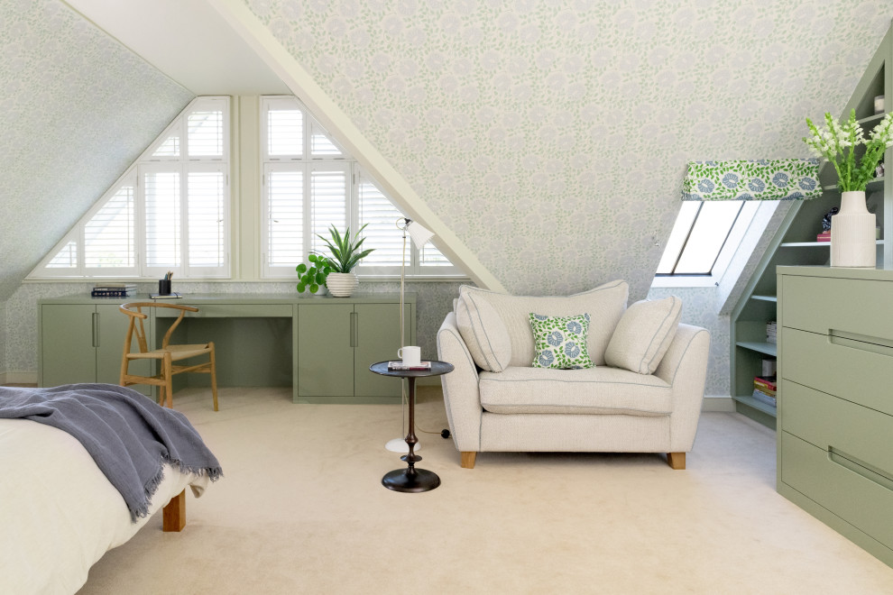 Trendy carpeted and wallpaper bedroom photo in London