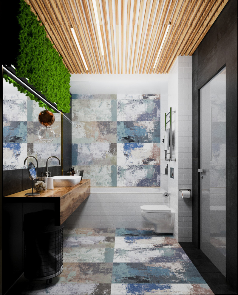 Интерьер санузла с зеленой стеной