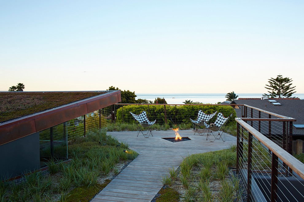 Inspiration for a contemporary deck in San Luis Obispo with a fire feature.