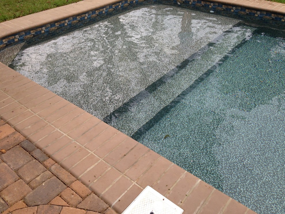 Transitional pool photo in Miami