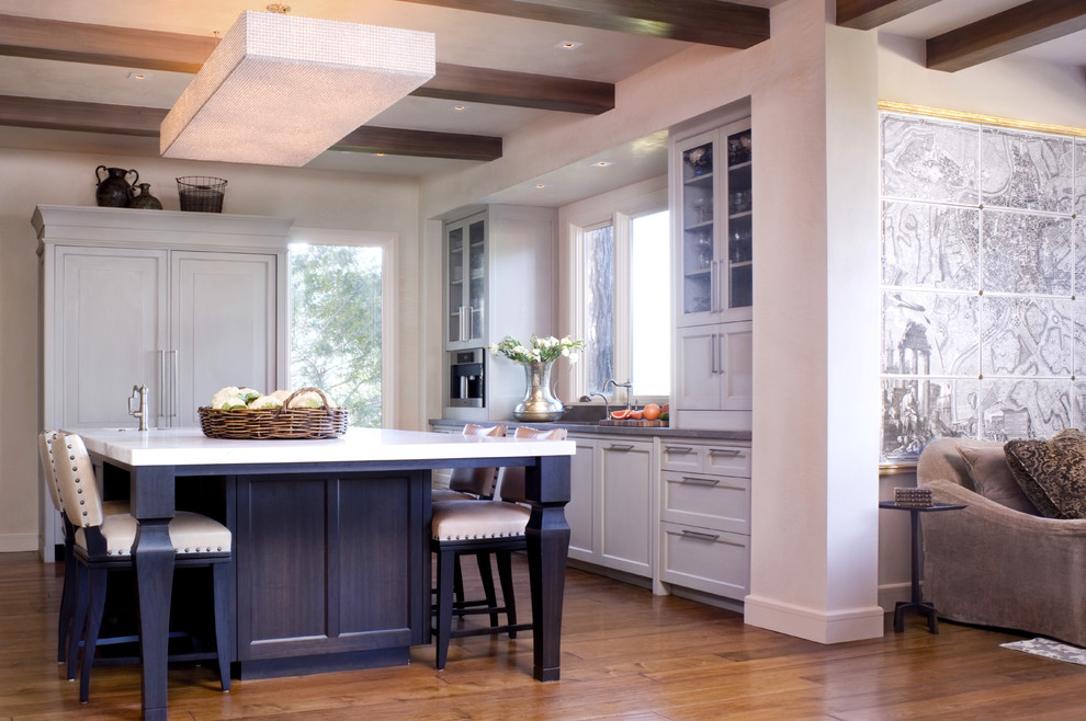 Photo of a transitional kitchen in San Francisco with glass-front cabinets and panelled appliances.