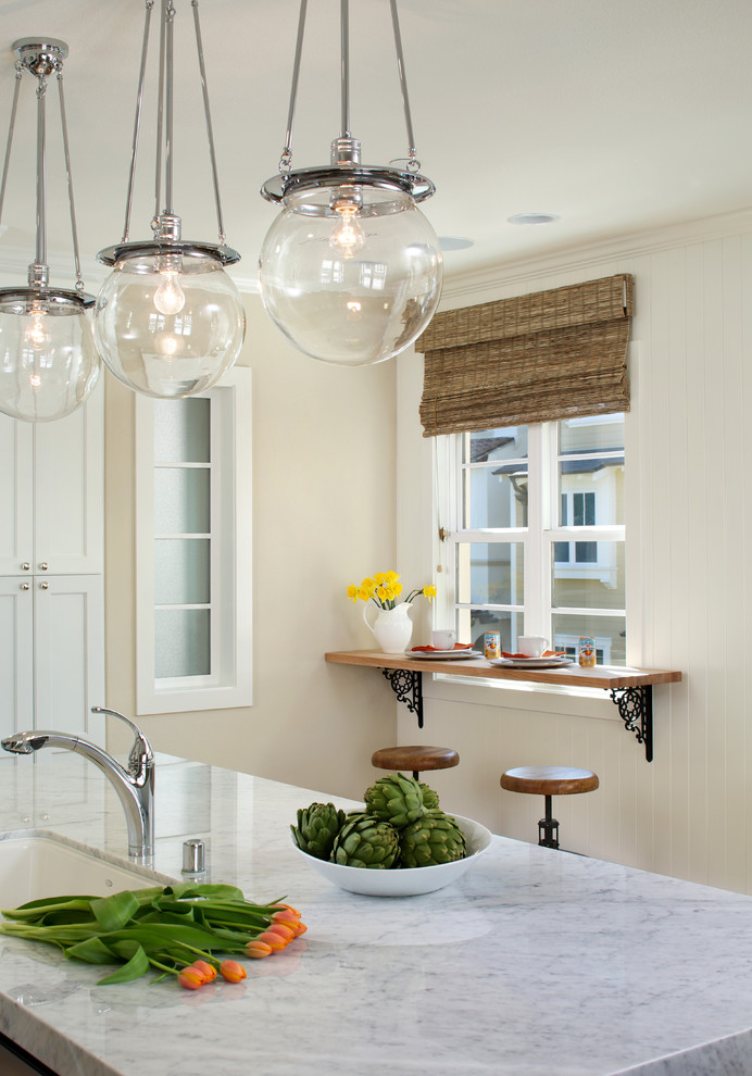 Design ideas for a traditional kitchen in San Francisco with an undermount sink and with island.