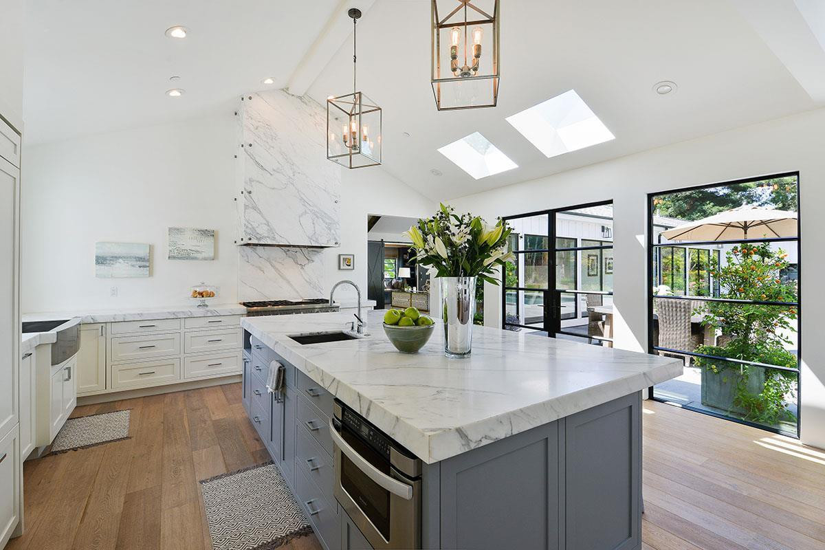 Remi Thomas - Remodeled kitchen with kitchen island