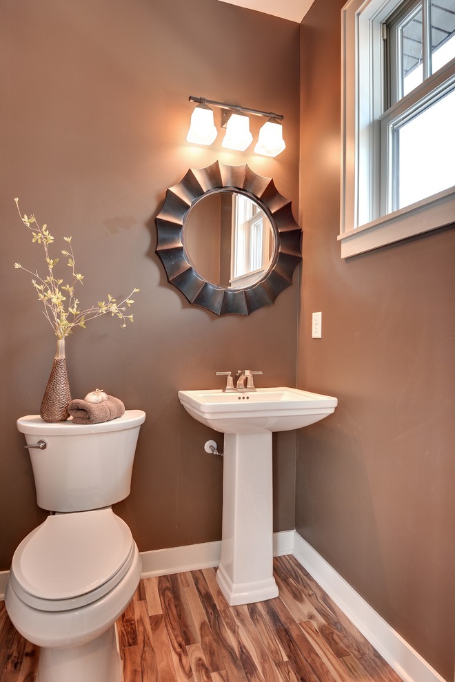Photo of a transitional powder room in Minneapolis with a pedestal sink.