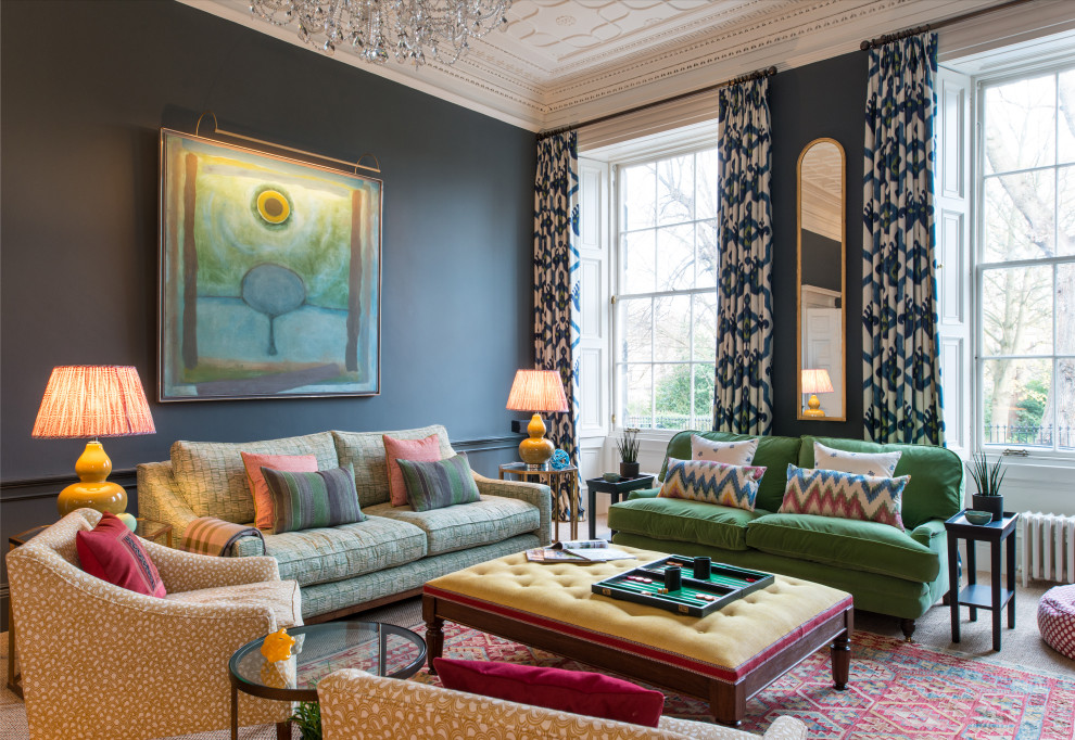 Inspiration for an eclectic living room in Edinburgh with black walls, medium hardwood flooring and brown floors.
