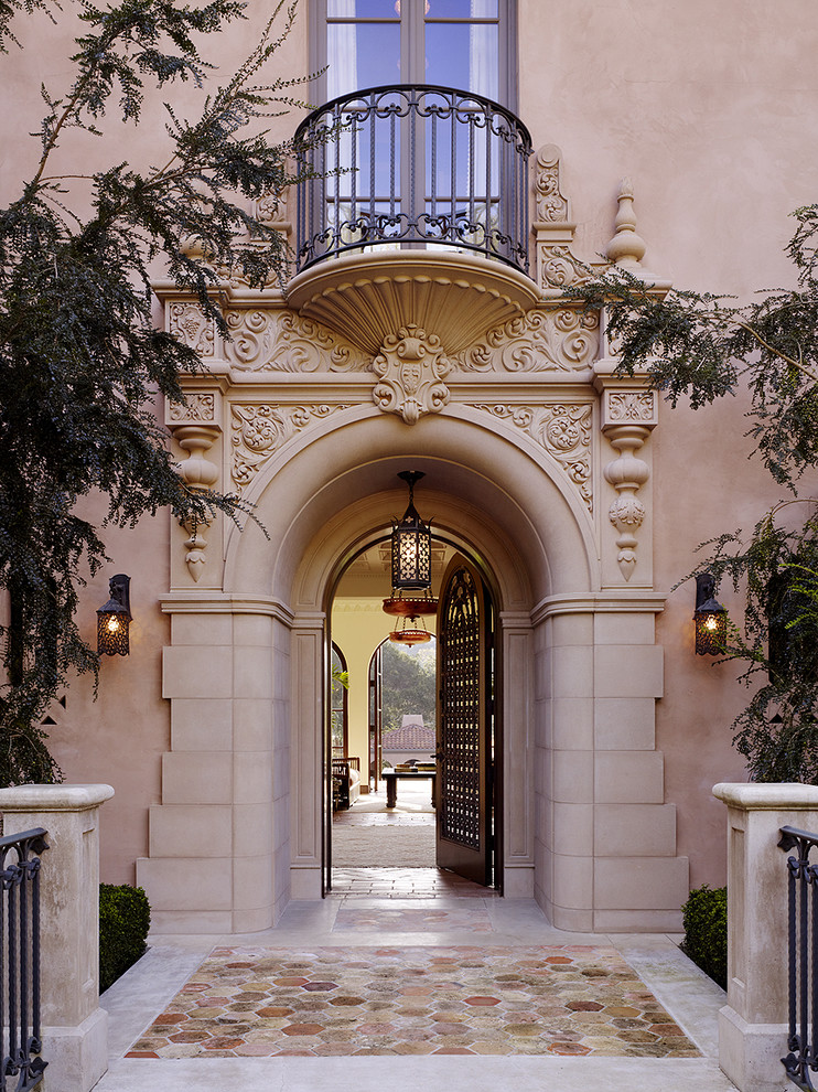 Design ideas for an expansive mediterranean entryway in San Francisco with terra-cotta floors and a single front door.