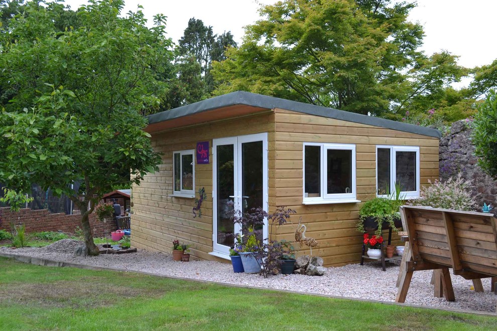 Small arts and crafts shed photo in Devon
