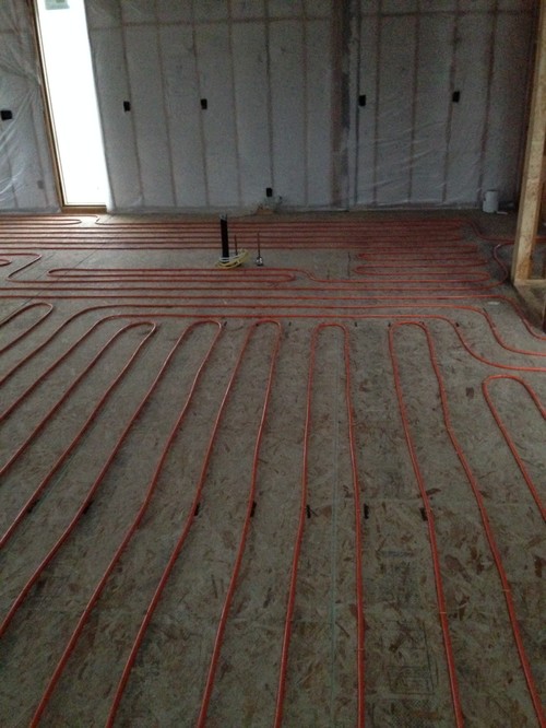 Concrete over a plywood subfloor with 16" on center floor