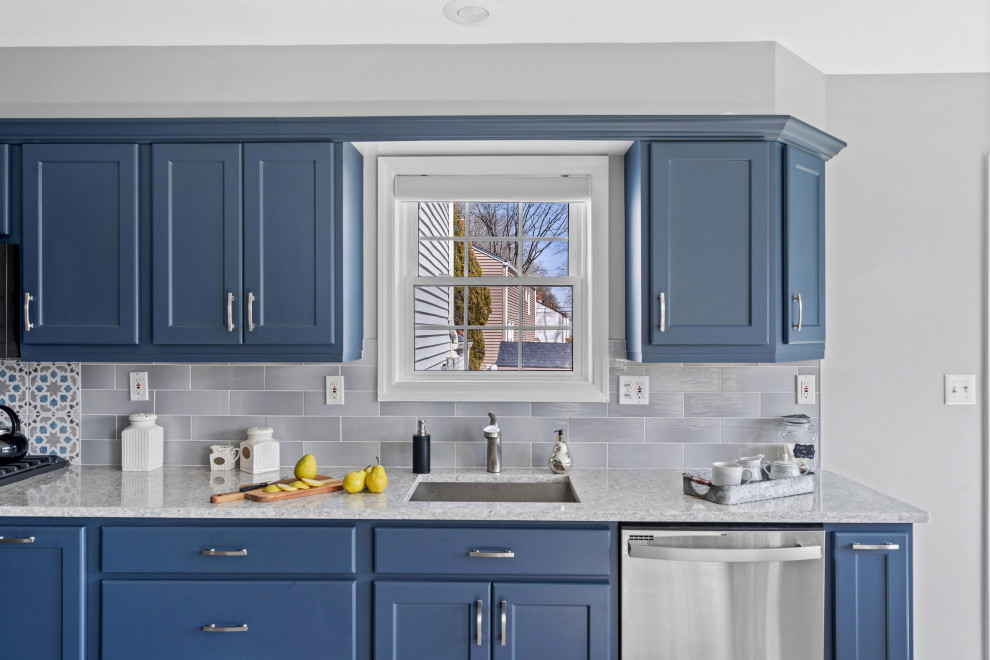 Example of a large transitional galley kitchen design in Other