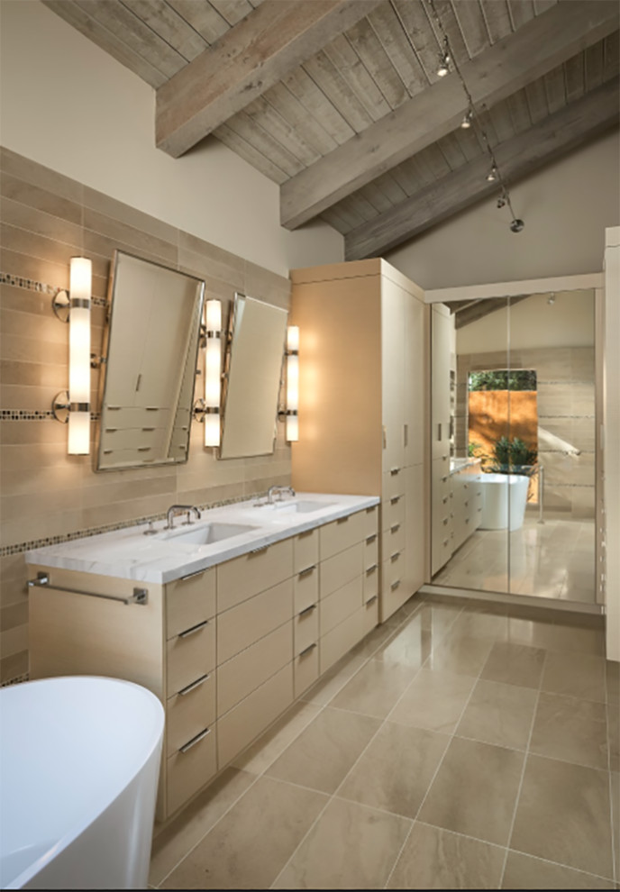 Design ideas for a contemporary bathroom in Los Angeles with flat-panel cabinets, beige cabinets, a japanese tub, a corner shower, a two-piece toilet, beige tile, ceramic tile, white walls, ceramic floors, an undermount sink, engineered quartz benchtops, beige floor and a hinged shower door.