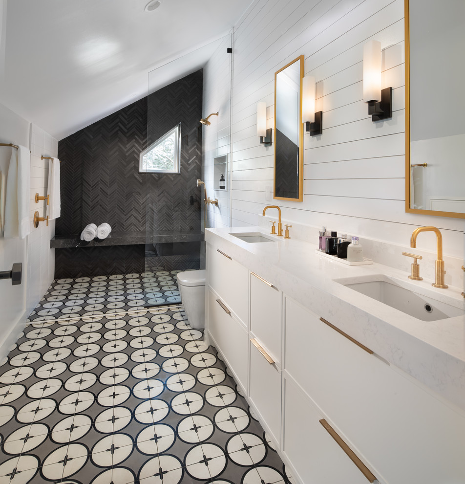 Large transitional master bathroom in DC Metro with recessed-panel cabinets, white cabinets, a curbless shower, a two-piece toilet, black tile, matchstick tile, white walls, ceramic floors, an undermount sink, engineered quartz benchtops, multi-coloured floor, an open shower and white benchtops.
