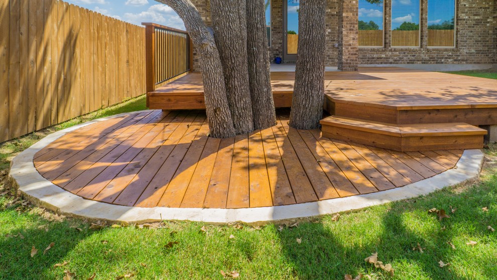 Home design - mid-sized transitional backyard home design idea in Austin with a roof extension