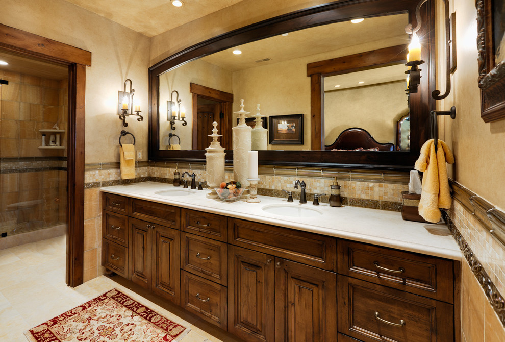Large arts and crafts master bathroom in Salt Lake City with raised-panel cabinets, dark wood cabinets, ceramic floors, an undermount sink, an alcove shower, beige tile, multi-coloured tile, orange tile, mosaic tile, beige walls and engineered quartz benchtops.
