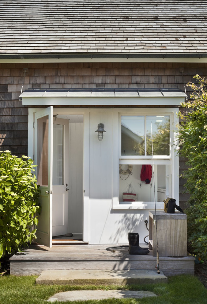 Beach style entryway in New York with a single front door and a white front door.