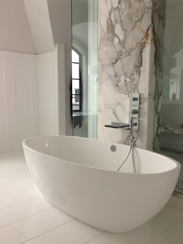 Photo of a transitional master bathroom in Calgary with flat-panel cabinets, dark wood cabinets, a freestanding tub, a double shower, white tile, an undermount sink, marble benchtops, stone tile and marble floors.