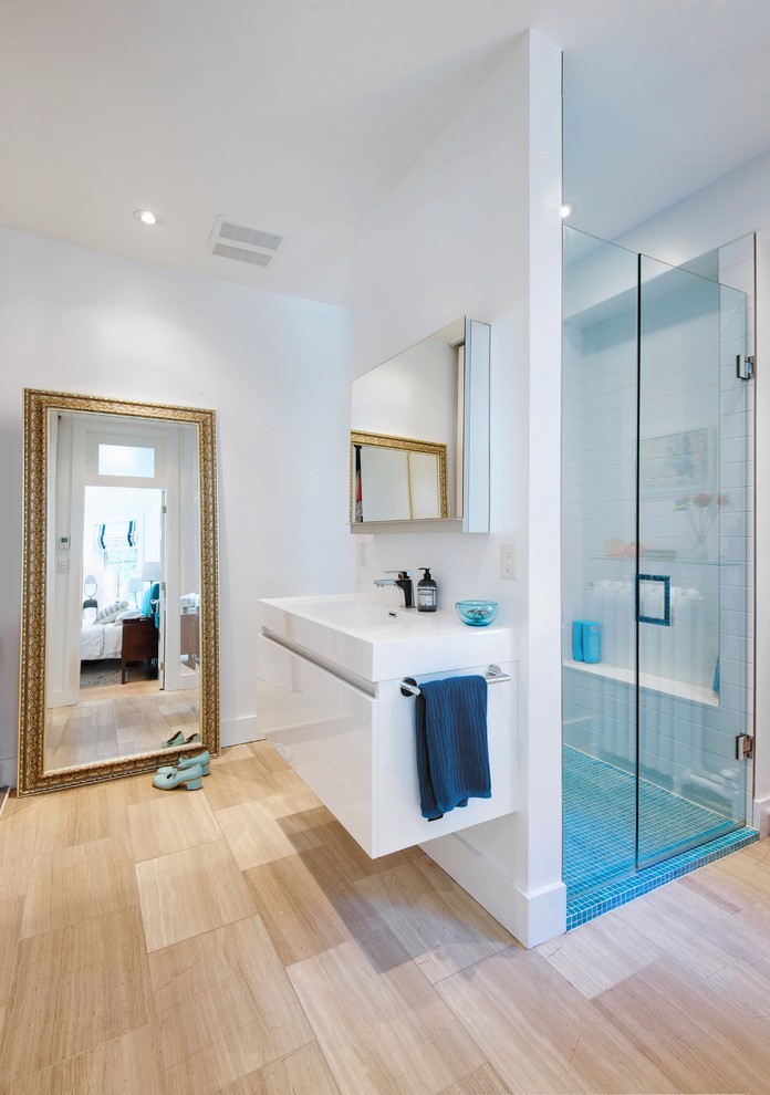 Inspiration for a mid-sized contemporary master bathroom in Toronto with an integrated sink, flat-panel cabinets, white cabinets, engineered quartz benchtops, an alcove shower, white tile, porcelain tile, white walls, porcelain floors and beige floor.