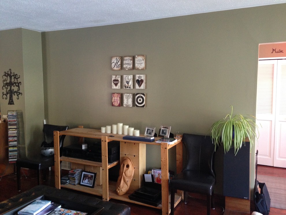 Living room wall prior to removal to kitchen