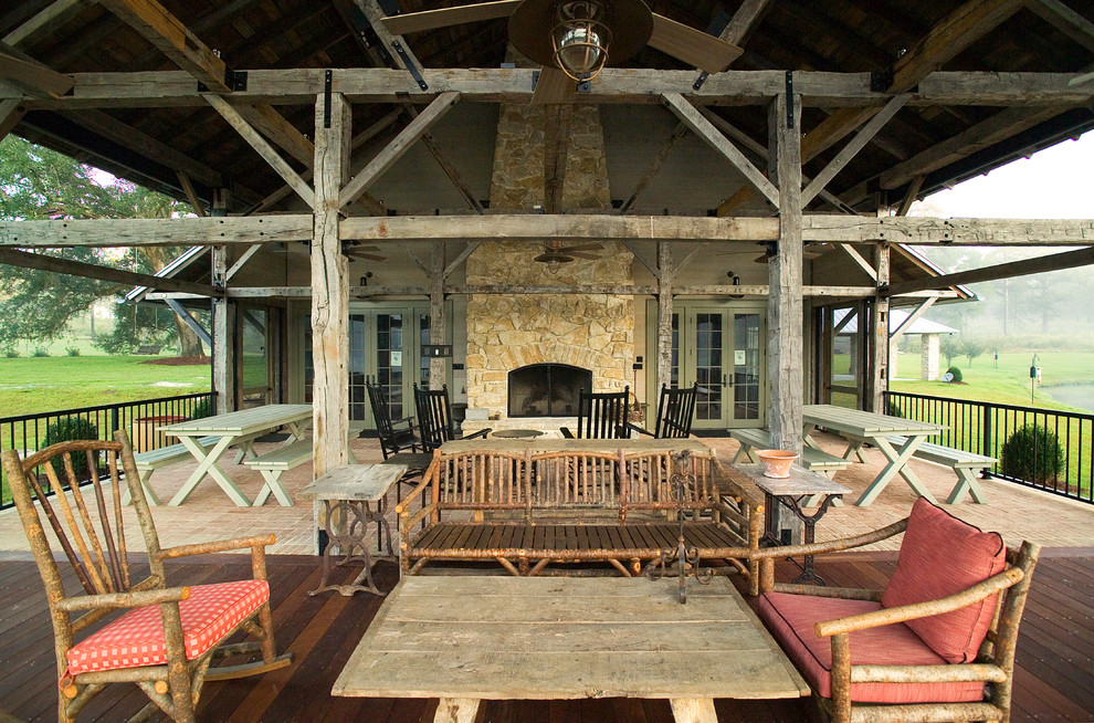 Country verandah in Atlanta with a fire feature.