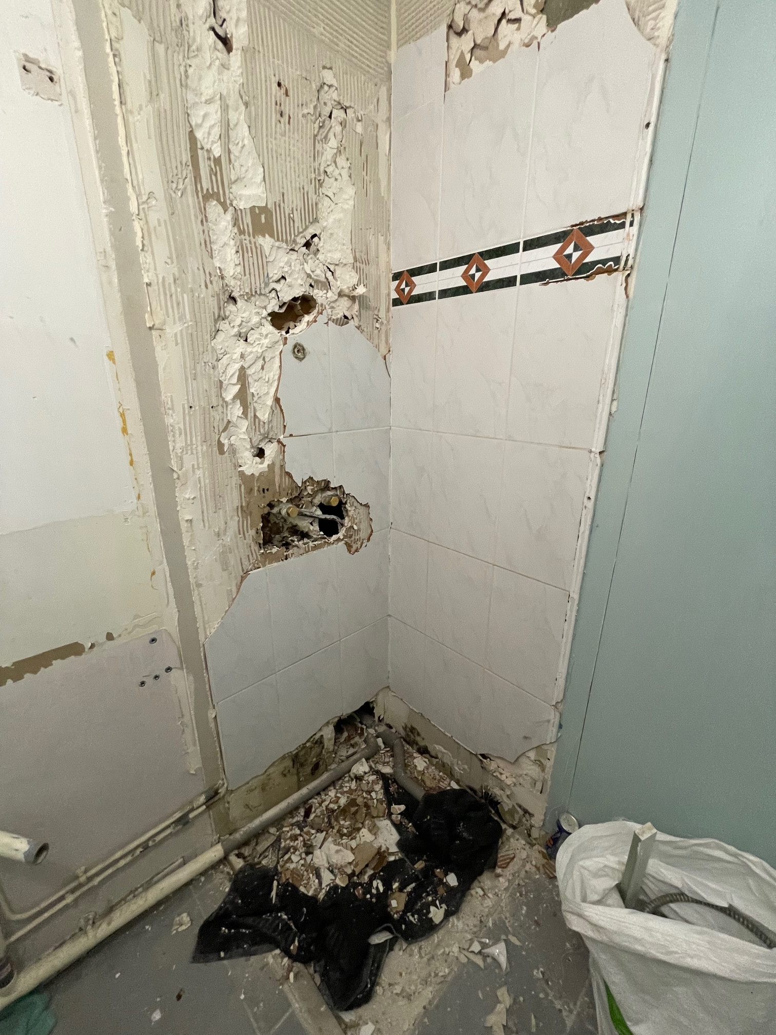 Salle de douche: rénovation totale après dégât des eaux