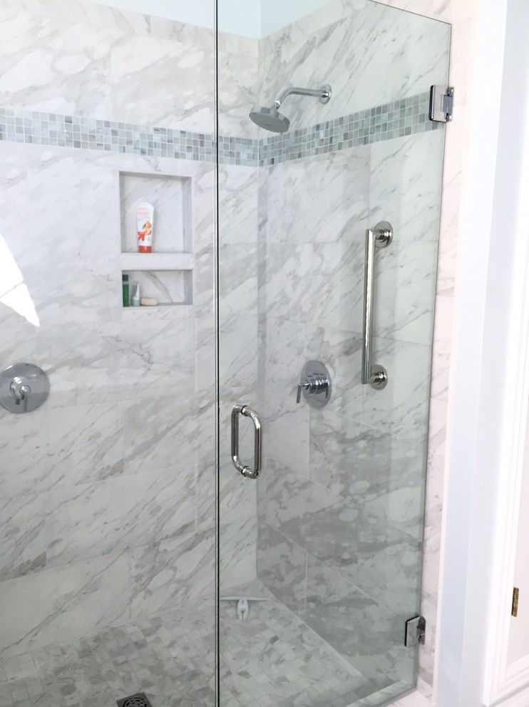 Design ideas for a mid-sized transitional master bathroom in Nashville with shaker cabinets, white cabinets, porcelain tile, engineered quartz benchtops, a curbless shower, a two-piece toilet, gray tile, white tile, grey walls, marble floors and an undermount sink.