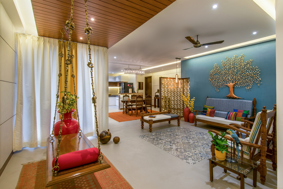 Eclectic entryway in Bengaluru with white walls.