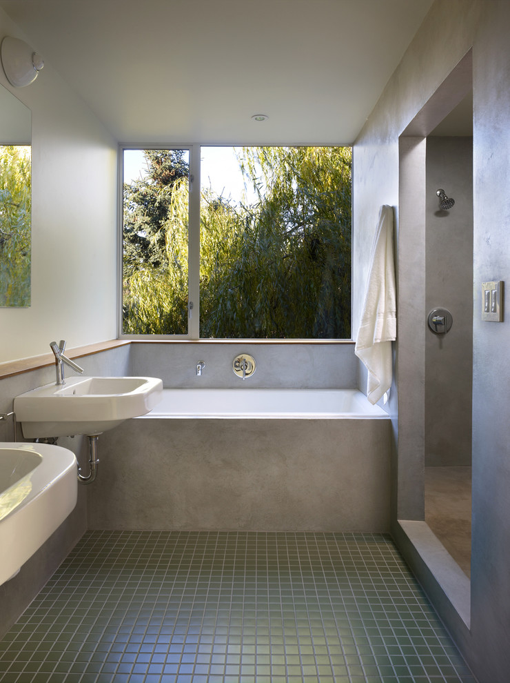 This is an example of a contemporary bathroom in Seattle with a wall-mount sink.