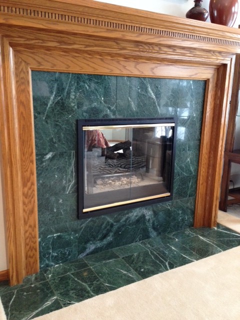 green tile fireplace w/white carpet! Plz Assist w/wall color This is the great room fireplace